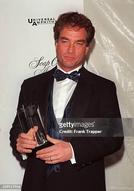 John Callahan, star of 'All my children', with his award for 'Outstanding Lead Actor'.