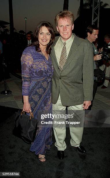 Gary Busey and his wife Tiani arrive.