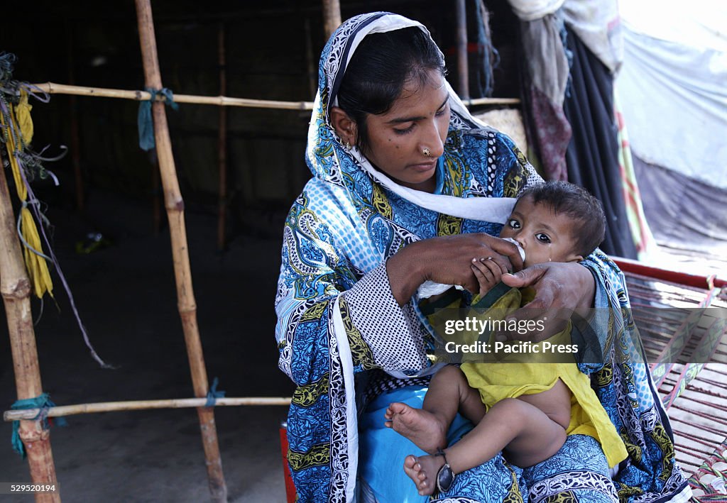 Pakistan Mami R Pakistani mother is playing and expressing affection to her child on ...