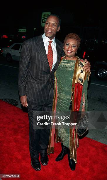 Danny Glover, co-star of the movie, arrives with his wife Asaka.