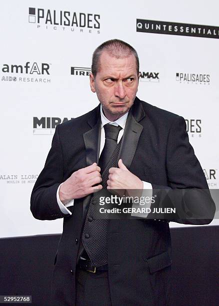 Director Frank Miller poses as he arrives for the American Foundation for AIDS Research "Cinema Against AIDS" benefit in Le Moulin de Mougins, 19 May...
