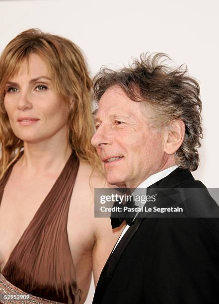Director Roman Polanski and wife Emmanuelle Seigner arrive at "Cinema Against AIDS 2005", the 12th annual event in aid of amfAR at Le Moulin de...