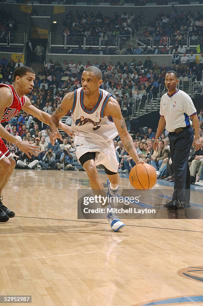 Juan Dixon of the Washington Wizards dribbles against the Chicago Bulls in game four of the Eastern Conference Quaterfinals during the 2005 NBA...