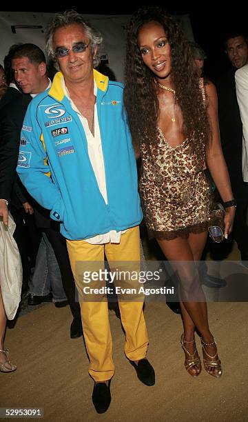 Flavio Briatore and model Naomi Campbell arrive at Naomi Campbell's Le Carnival D'Or party at VIP Terraces, Palm Beach during the 58th International...