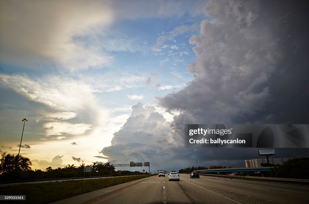 Highway with storm clouds