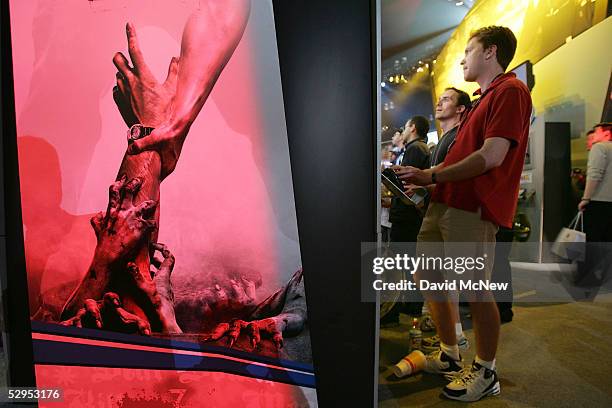 Gamers play Resident Evil Outbreak File at the 11th annual Electronic Entertainment Expo on May 19, 2005 in Los Angeles, California. More than 1,000...