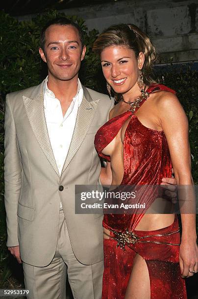 Designer Scott Henshall and Hofit Golan arrive at Naomi Campbell's Le Carnival D'Or party at VIP Terraces, Palm Beach during the 58th International...