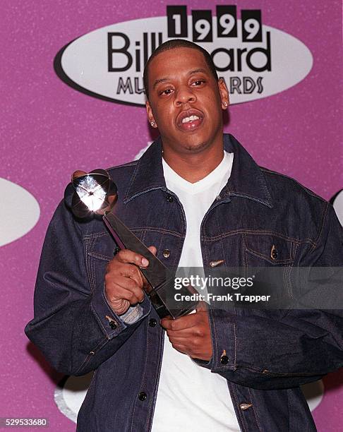 Jay-Z with his award.