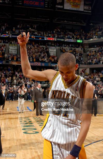 Reggie Miller of the Indiana Pacers walks off the court for the last time in the final seconds of Game six of the Eastern Conference Semifinals...