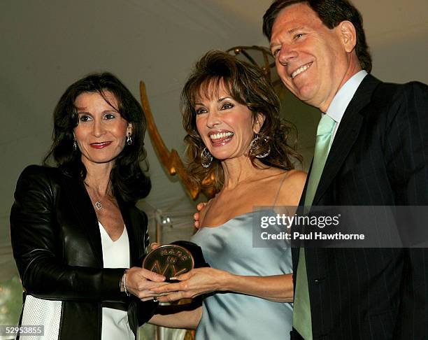 Actress Susan Lucci is honored by Katherine Oliver of the Mayor's Office of Film and Peter Price, President of the National Television Academy,...