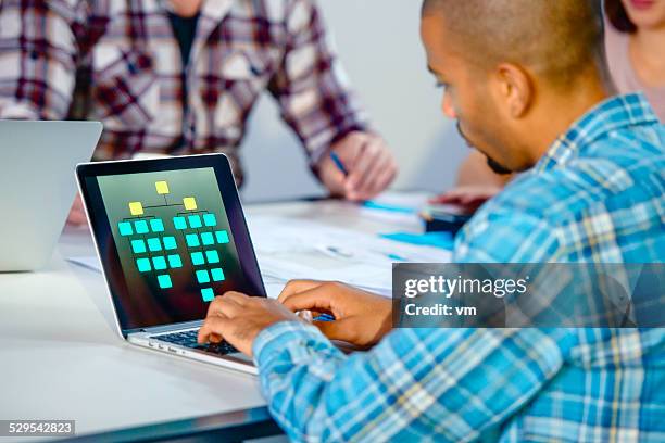 creating a presentation on a laptop - organisation chart stock pictures, royalty-free photos & images