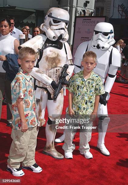 Dylan and Cole Sprouse and Storm Troopers arrive at Grauman's Chinese Theatre for the charity premiere of "Star Wars: Episode II Attack of the...