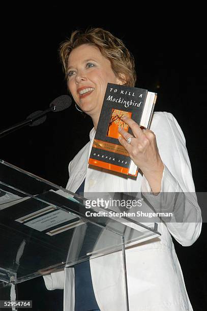 Actress Annette Bening holds a copy of Harper Lee's book "To Kill A Mockingbird" while speaking at the Library Foundation of Los Angeles 2005 Awards...