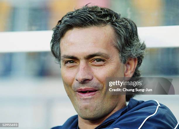 Chelsea coach, Jose Mourhino, smiles during a friendly match between Chelsea and Suwon Samsung Bluewings on May 20, 2005 in Suwon, South Korea....