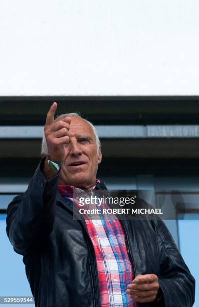 Dietrich Mateschitz, Austrian businessman and co-founder of the Red Bull energy drink compan, gestures during the German second division Bundesliga...