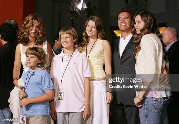 Governor Arnold Schwarzenegger and his wife Maria Shriver pose with their children Chris, Patrick, Christina and Katherine at the premiere of...