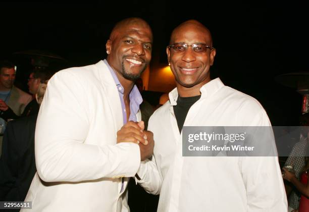 Actor Terry Crewes and former NFL player Eric Dickerson pose at the afterparty for the premiere of Paramount Pictures' "The Longest Yard" on May 19,...