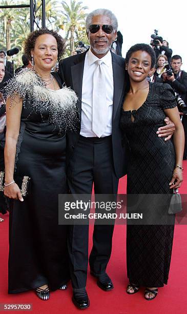 Actor Morgan Freeman , his wife Myrna Colley-Lee and daughter Deena pose as they arrive for the screening of US actor/director Tommy Lee Jones' film...