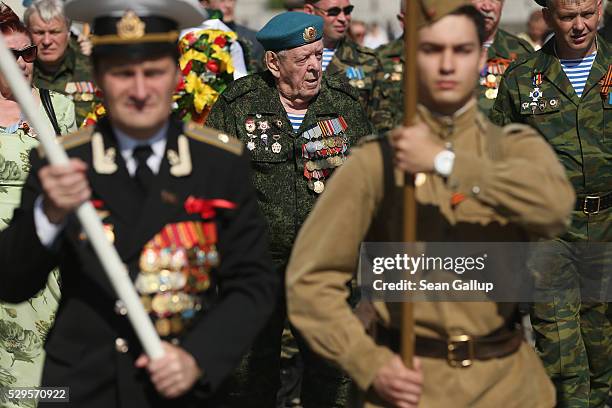 Georgii Savilyevich a veteran of the Soviet Red Army and who participated in the liberation of Vienna and Prague from the Nazis, arrives with Russian...