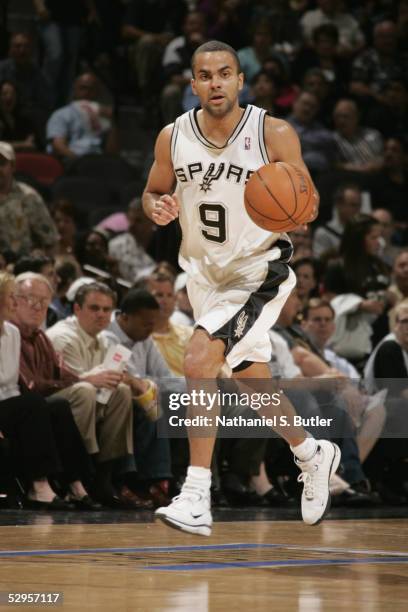 Tony Parker of the San Antonio Spurs dribbles upcourt against the Seattle SuperSonics in Game two of the Western Conference Semifinals of the 2005...