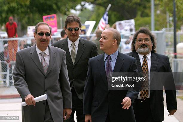 Defense witness and former attorney for Michael Jackson, Mark Geragos, Steve Graff, Pat Harris and defense attorney Jesus Castillo arrive for...