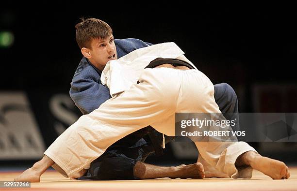 Hungarian Miklos Ungvari is beaten during the finals of the under-66kg by Elchin Ismaylov of Azerbaijan at the European Judo Championship in...