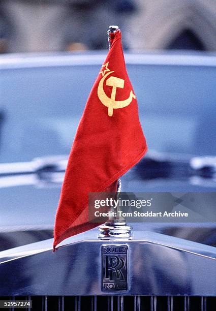 The communist red flag of the former Soviet Union flies on the bonnet of a Rolls Royce which was used by President Mikail Gorbachov on a state visit...