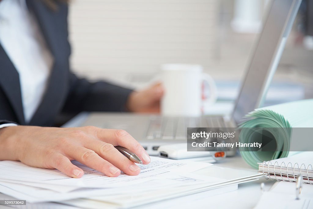 Businesswoman working at her desk