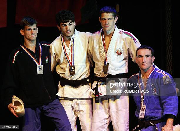 Hungarian Miklos Ungvari , Elchin Ismaylov from Azerbeizjan, Aliaksander Shlyk from Belarus and French Benjamin Darbelet show their medals, in the...