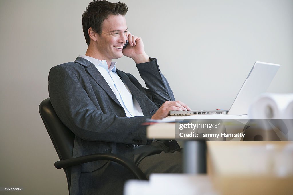 Businessman talking on cell phone