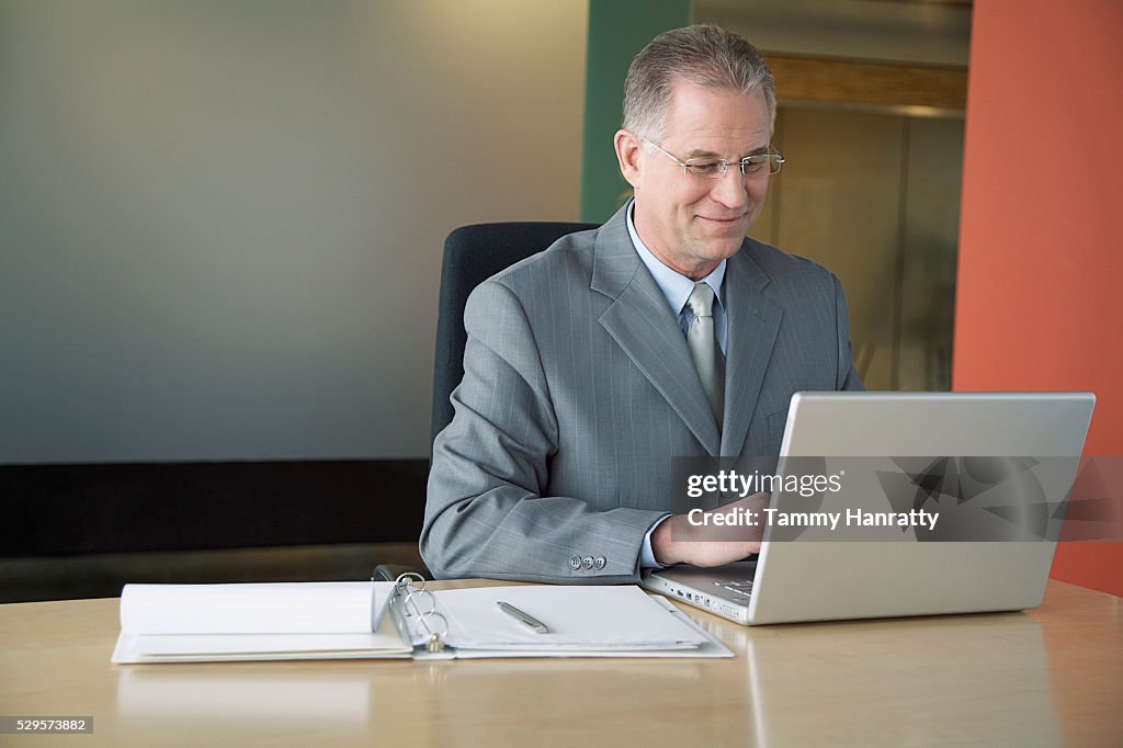 Businessman working on laptop