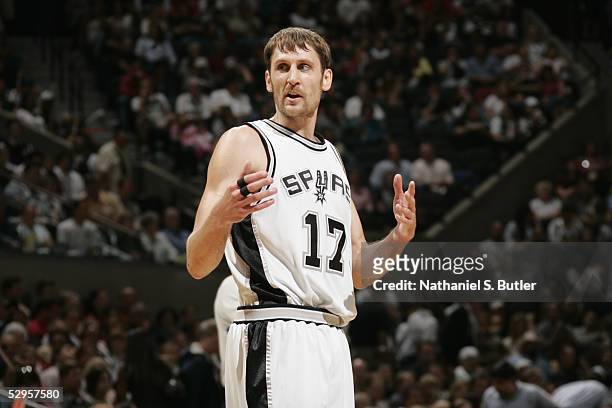 Brent Barry of the San Antonio Spurs stands on the court against the Seattle SuperSonics in Game One of the Western Conference Semifinals during the...