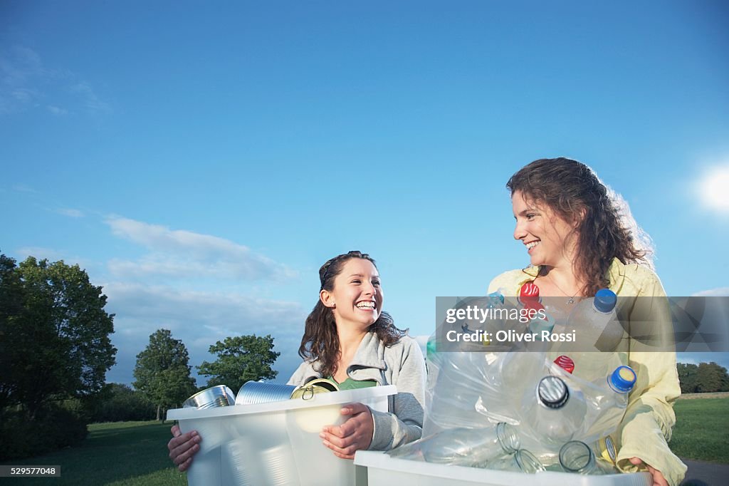 Women with Recycling Bins