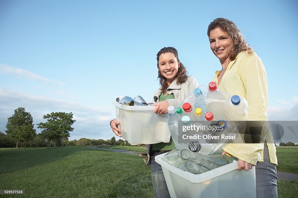 Women with Recycling Bins