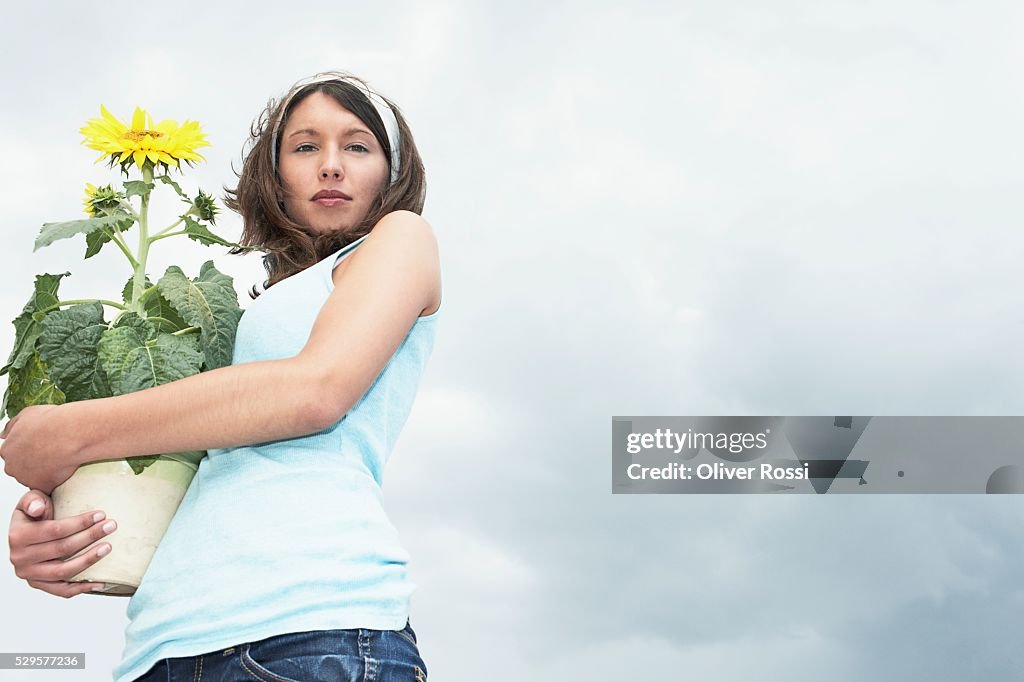 Woman with Potted Plant