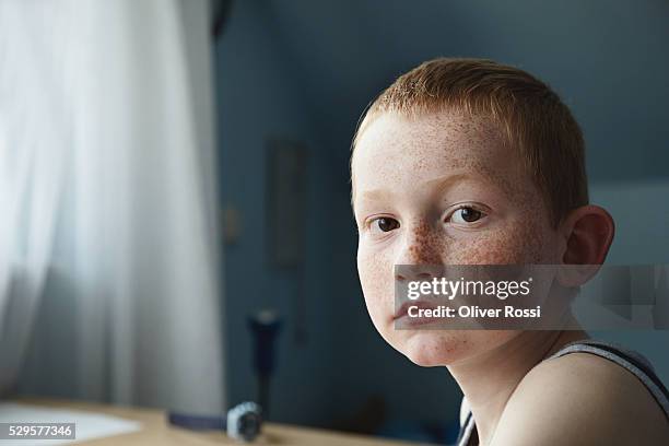 boy in room - boy freckle stock pictures, royalty-free photos & images