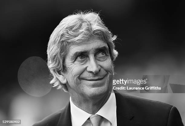 Manuel Pellegrini of Manchester City looks on during the Barclays Premier League match between Manchester City and Arsenal at the Etihad Stadium on...