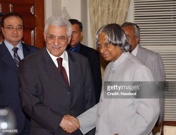 Palestianian Prime Minister Mahmud Abbas shakes hands with Indian President Abdul Kalam. Abbas was on a two-day visit to India following his visit to...
