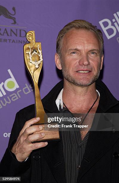 Sting in the press room with his Century Award at the 2003 Billboard Music Awards.