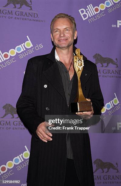Sting in the press room with his Century Award at the 2003 Billboard Music Awards.