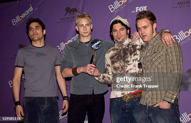 Trapt in the press room with award for Rock Track of the Year at the 2003 Billboard Music Awards.