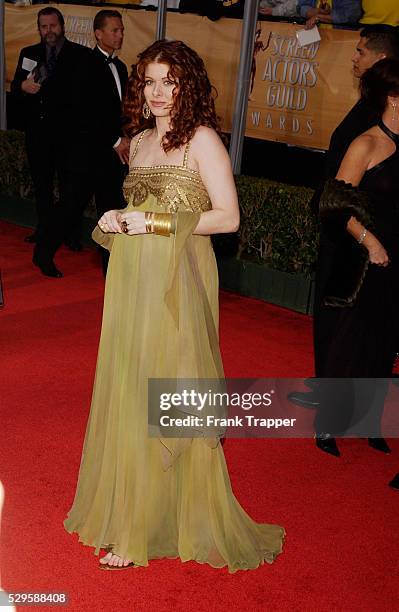 Debra Messing arrives at the 10th Annual Screen Actors Guild Awards.