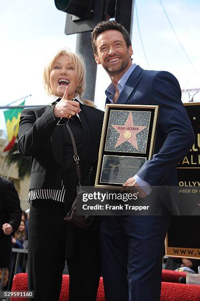 Actor Hugh Jackman pose with his wife Deborra-Lee Furness at the ceremony that honored with a Star on the Hollywood Walk of Fame, held in front of...