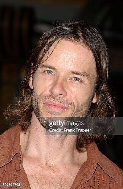 Guy Pearce arrives at the premiere of "Godsend."