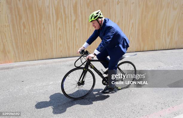 Former Mayor of London and Conservative MP for Uxbridge and South Ruislip, Boris Johnson rides away after delivering a speech on the European Union...