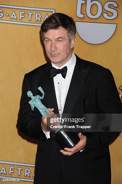 Actor Alec Baldwin, winner of Outstanding Performance by a Male Actor in a Comedy Series for 30 Rock, posing at the 19th Annual Screen Actors Guild...