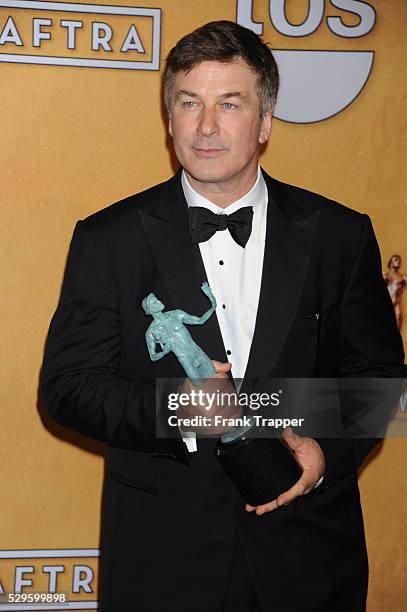 Actor Alec Baldwin, winner of Outstanding Performance by a Male Actor in a Comedy Series for 30 Rock, posing at the 19th Annual Screen Actors Guild...