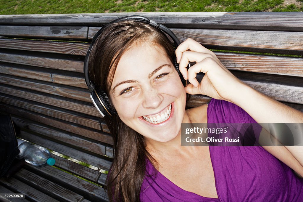 Portrait of teen (16-17) girl listening to music