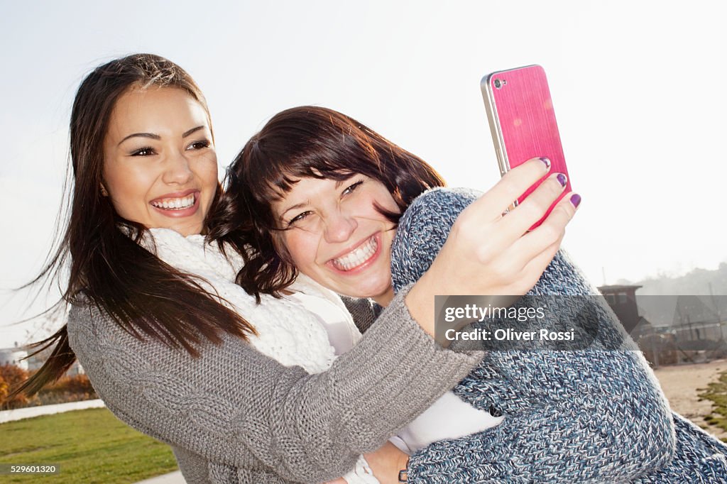 Teen (16-17) girls taking self-portrait photo