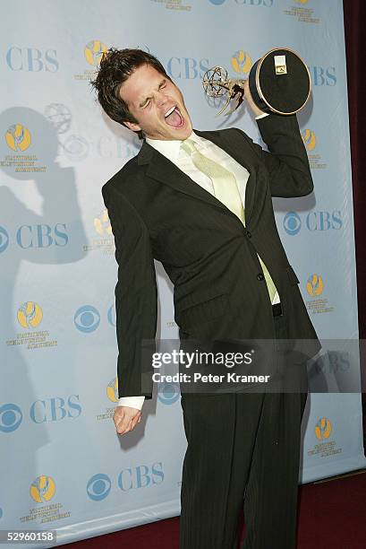 Actor Greg Rikaart poses with the award for outstanding supporting actor in the press room at the 32nd Annual Daytime Emmy Awards at Radio City Music...